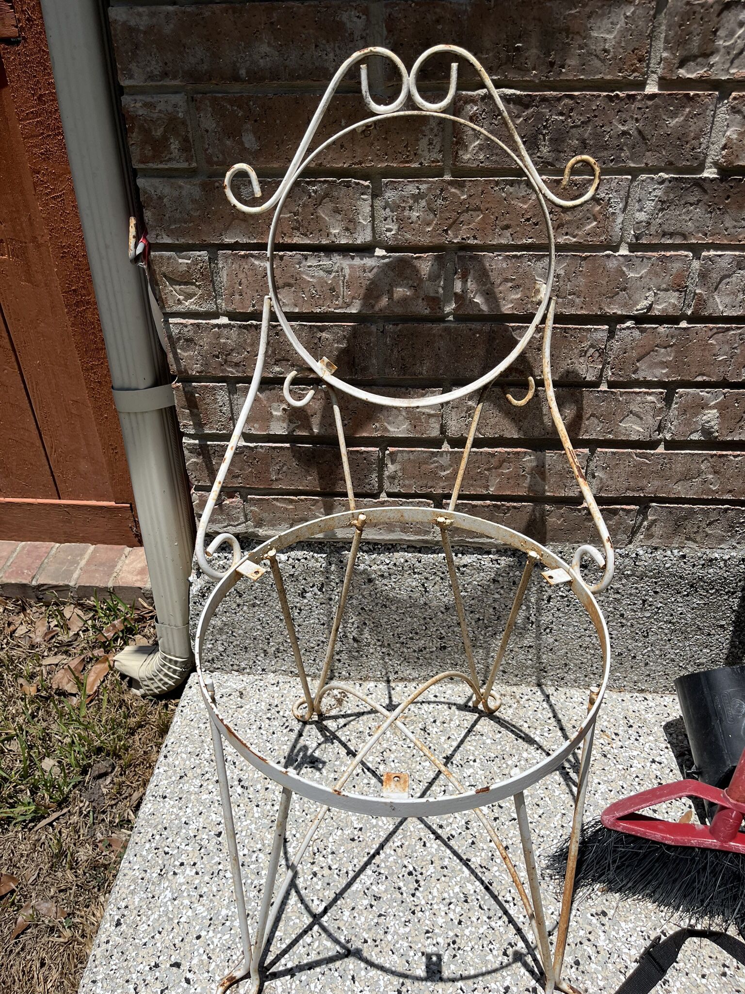 Selling Wrought Iron Vintage Chairs that are Perfect to Hold Flower Pots