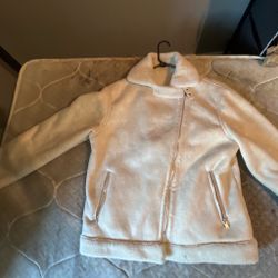 Cream colored aviator bomber