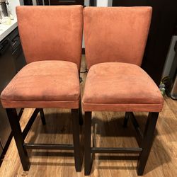 Sturdy Pair Of Orange Bar Stools