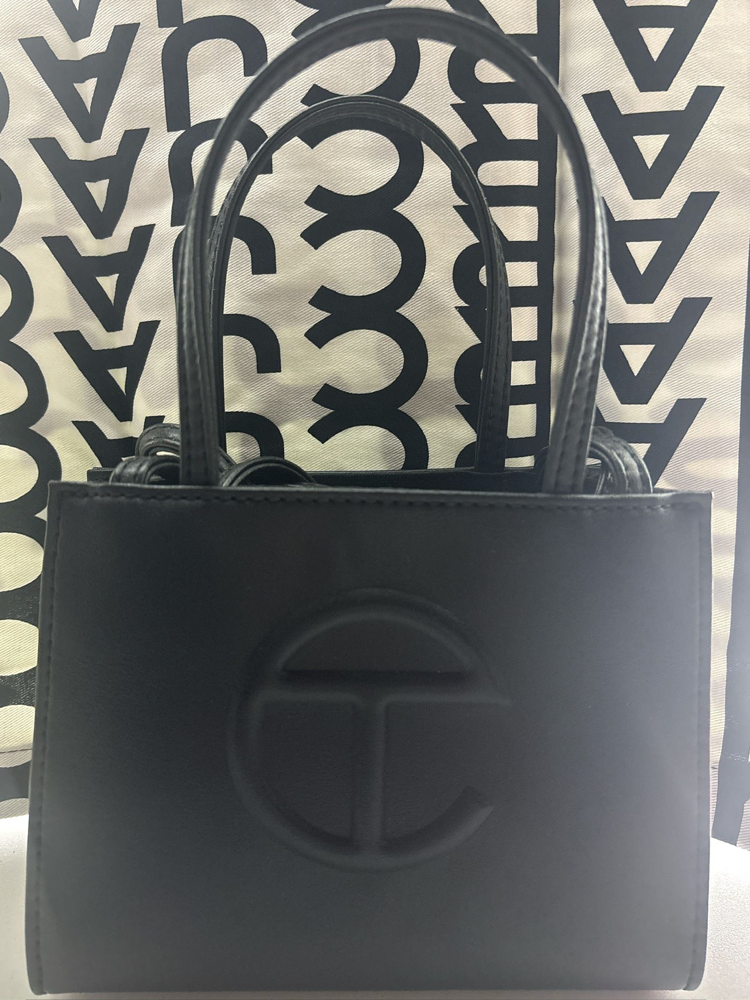 black telar mini telfar purse 