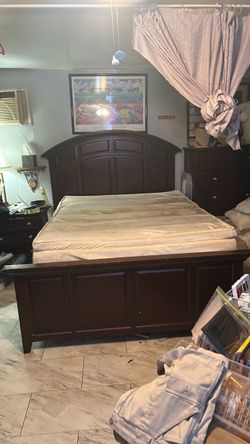 Queen size bed frame with temperpedic mattress.  Used