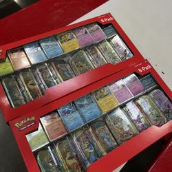 Pokemon Prismatic Costco Tins 