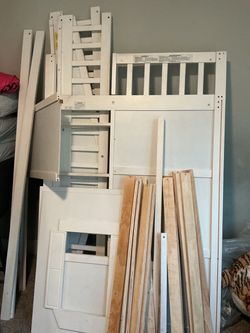 All white clubhouse loft bed with build in latter