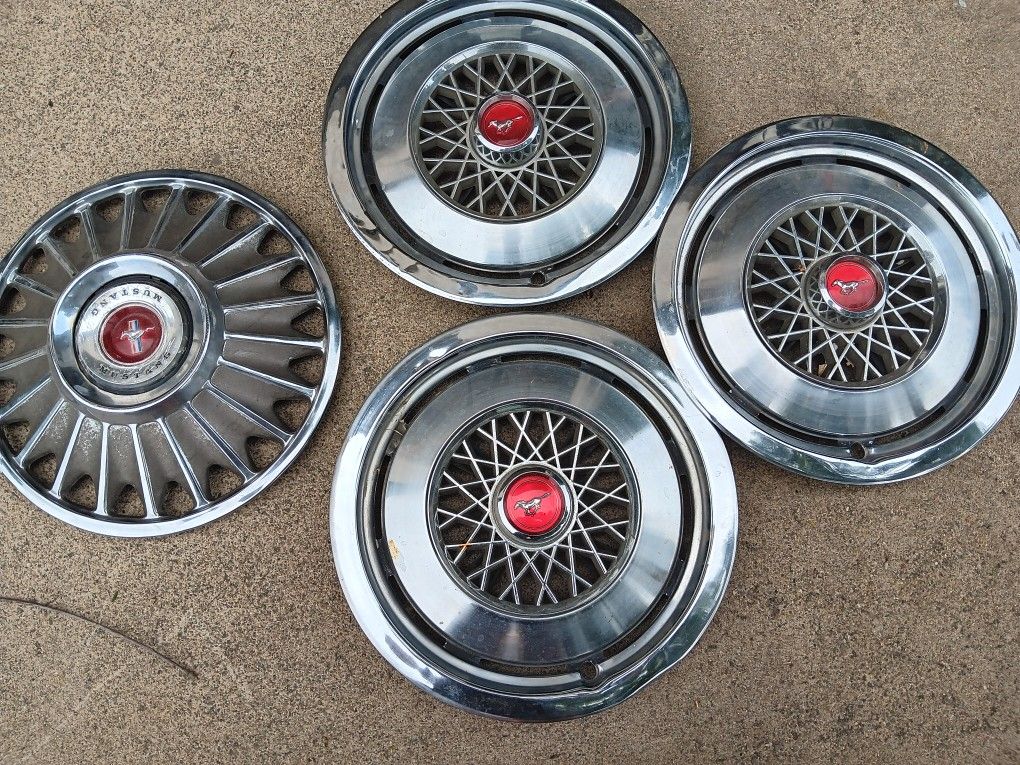4 Vintage Mustang Hubcaps