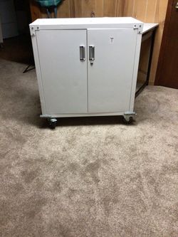 Rolling white cabinet
