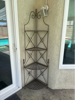 Wrought iron corner shelves