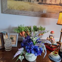 White Pitcher with entire floral arrangement.