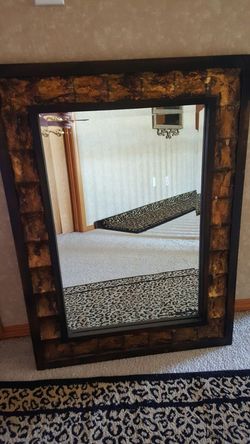 Decorative entry way mirror.