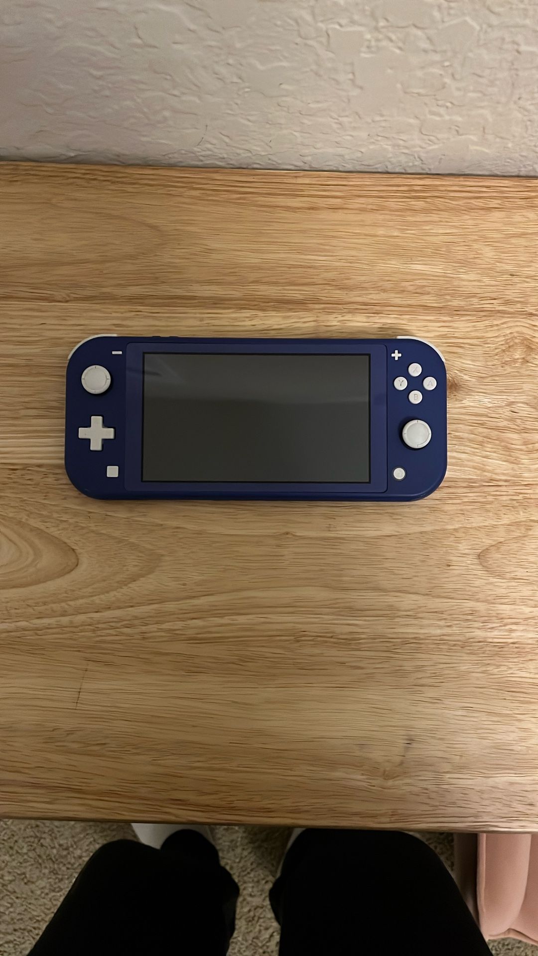 Nintendo Switch Lite + Super Mario’s Bros U Deluxe