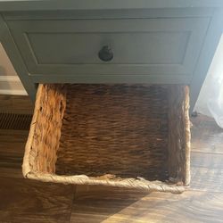 Side table with wicker baskets