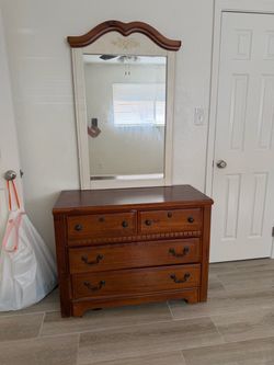Wooden dresser with mirror