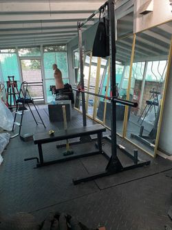 Half rack w flat bench + Oly barbell