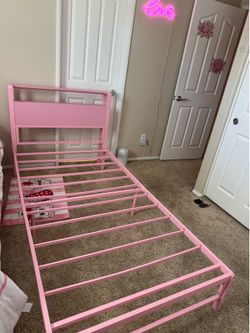 Pink twin bedframe