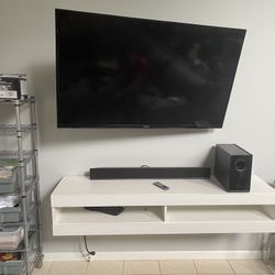Floating White Entertainment Stand With Lights