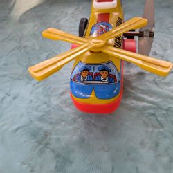 Rare Vintage Wind Up Tin Toy Used Emergency Helicopter made in Korea
Double Rotor Blade 
Wind Up controlled with Key included Works Great
Both Blades 