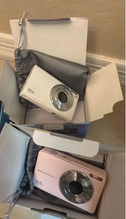 New pink and white 4 k camera with sd cards and battery and lanlord