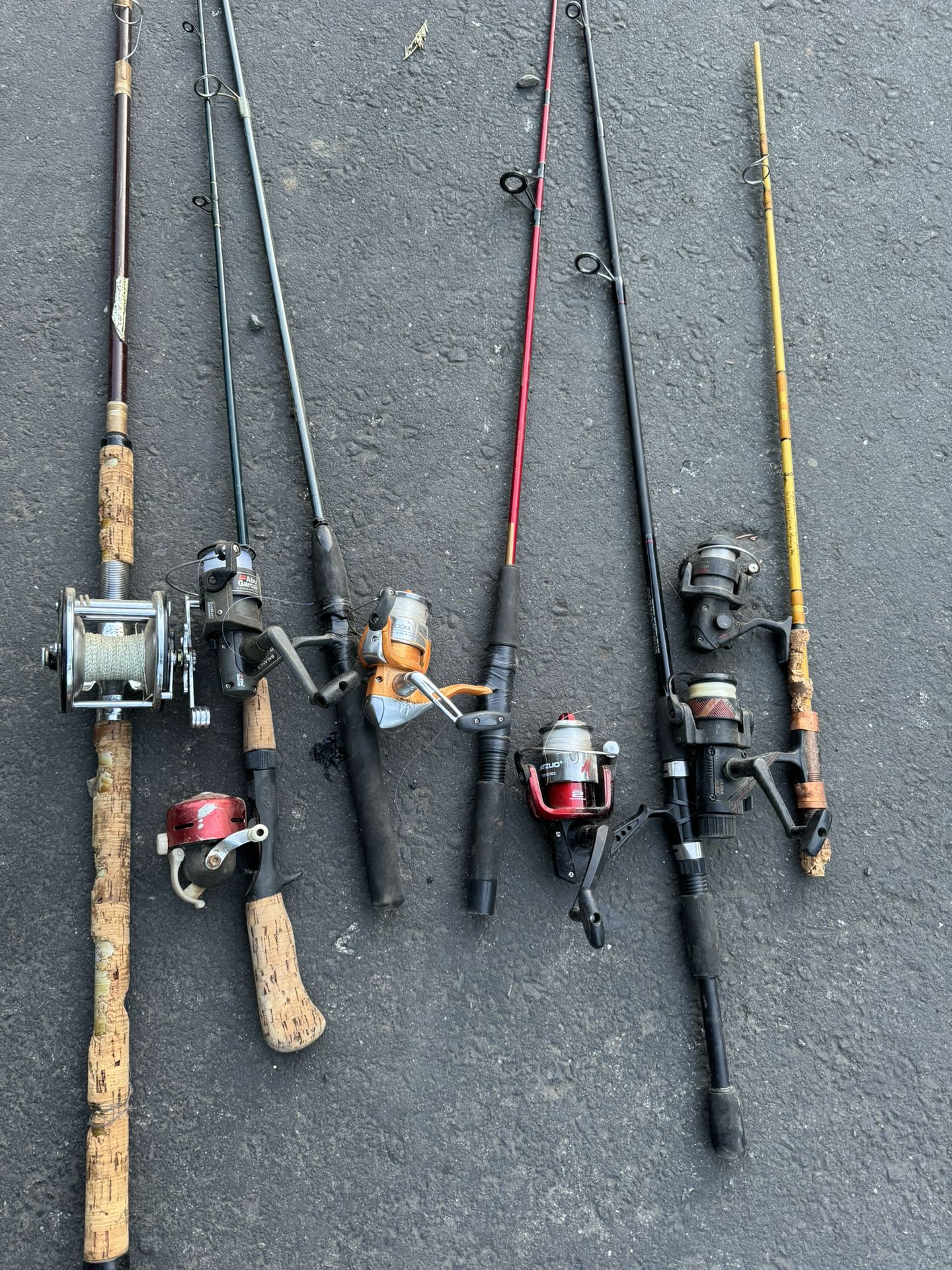 6 fishing poles  with Reels an 23 fishing poles with no Reels used 