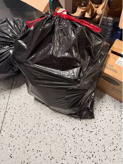 Bag full of plastic hangers