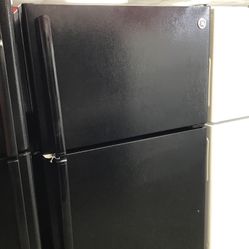 GE 15 Cu Ft Top And Bottom Fridge. 1 year Warranty 