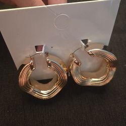 Thick gold hoop earrings