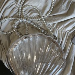 Clear shell purse with pearls