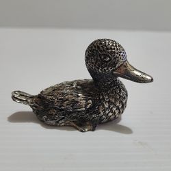 VINTAGE PEWTER DUCK SCULPTURE PAPERWEIGHT DECOR FIGURINE 2" Tall 8Oz.

Used item old vintage beautiful solid metal duck weighs 8 Oz. 