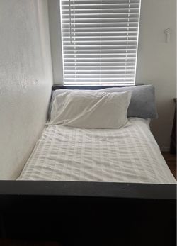 Twin bed with mattress