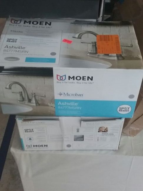 A Moen model Asheville 84777 msrn faucet