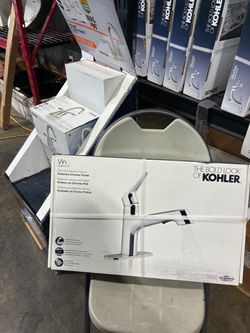 Kohler Pull-out kitchen sink faucet with two-function sprayhead