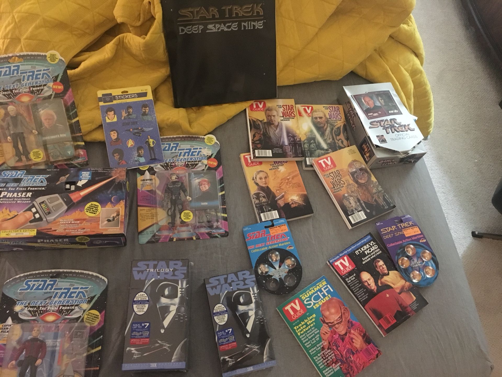 Various Star Trek and Star Wars collectibles