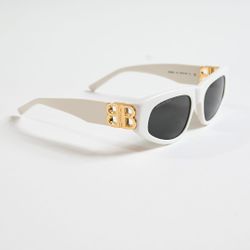 Sunglasses with a gold logo. Brand new.