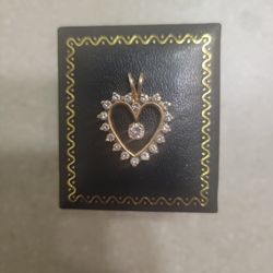14 K Gold Diamond Pendant.  Weight Is 3.8 Grams 