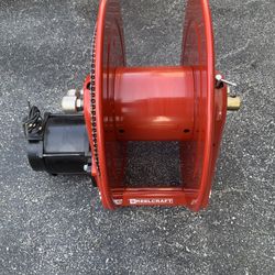 REEL CRAFT ELECTRIC REWIND WATER AND AIR HOSE REEL.  BRAND NEW. NO BOX OR MANUAL.