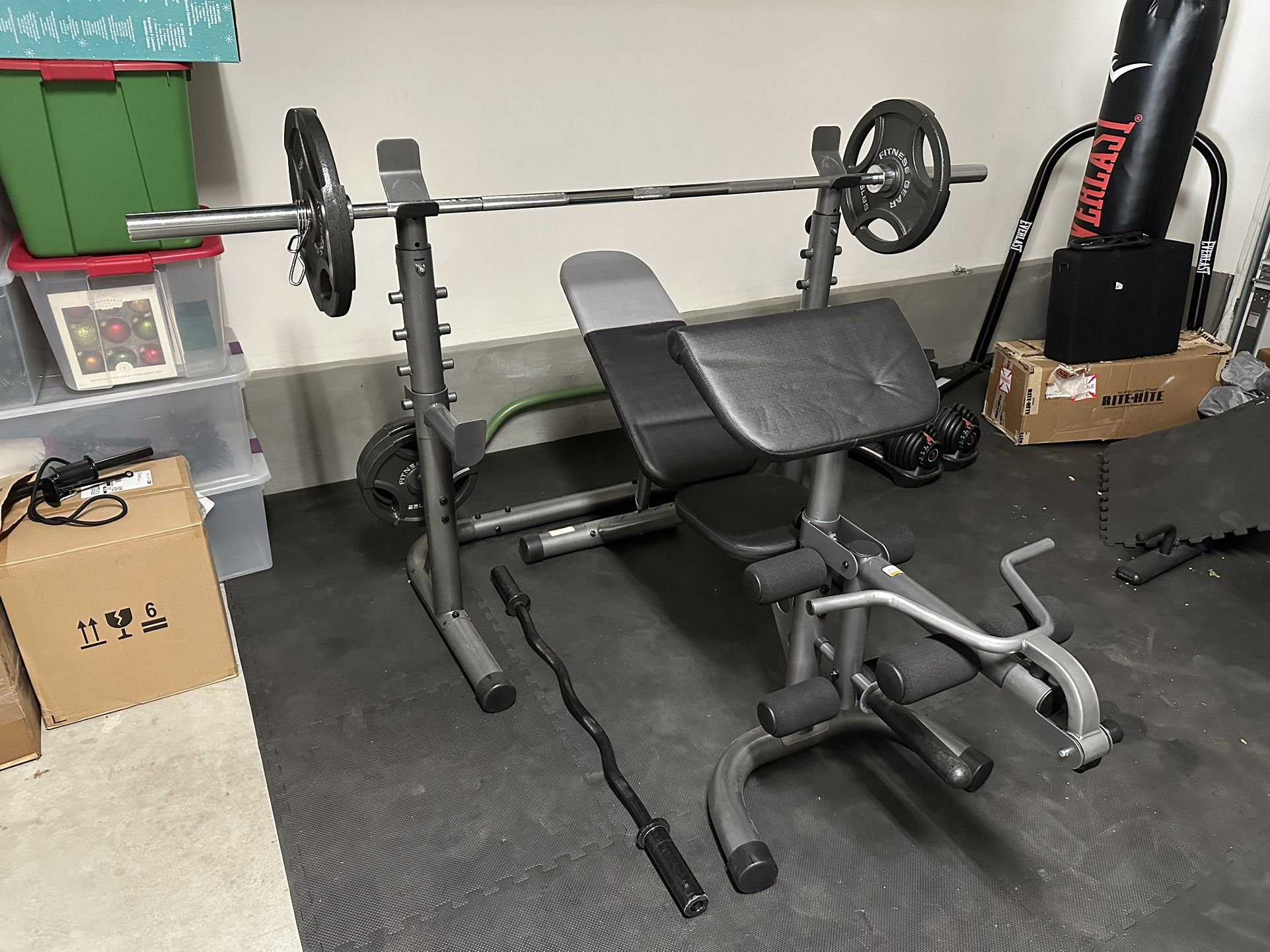 Weider XRS 20 Adjustable Bench with Olympic Squat Rack and Preacher Pad And Fitness Gear 300 lb. Olympic Weight Set