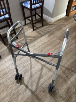 Brand new, easy collapsible walker