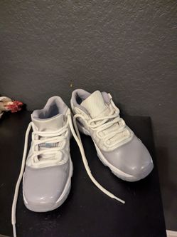 Nike Air Jordan 11 Retro Low in Cement Grey Sneakers