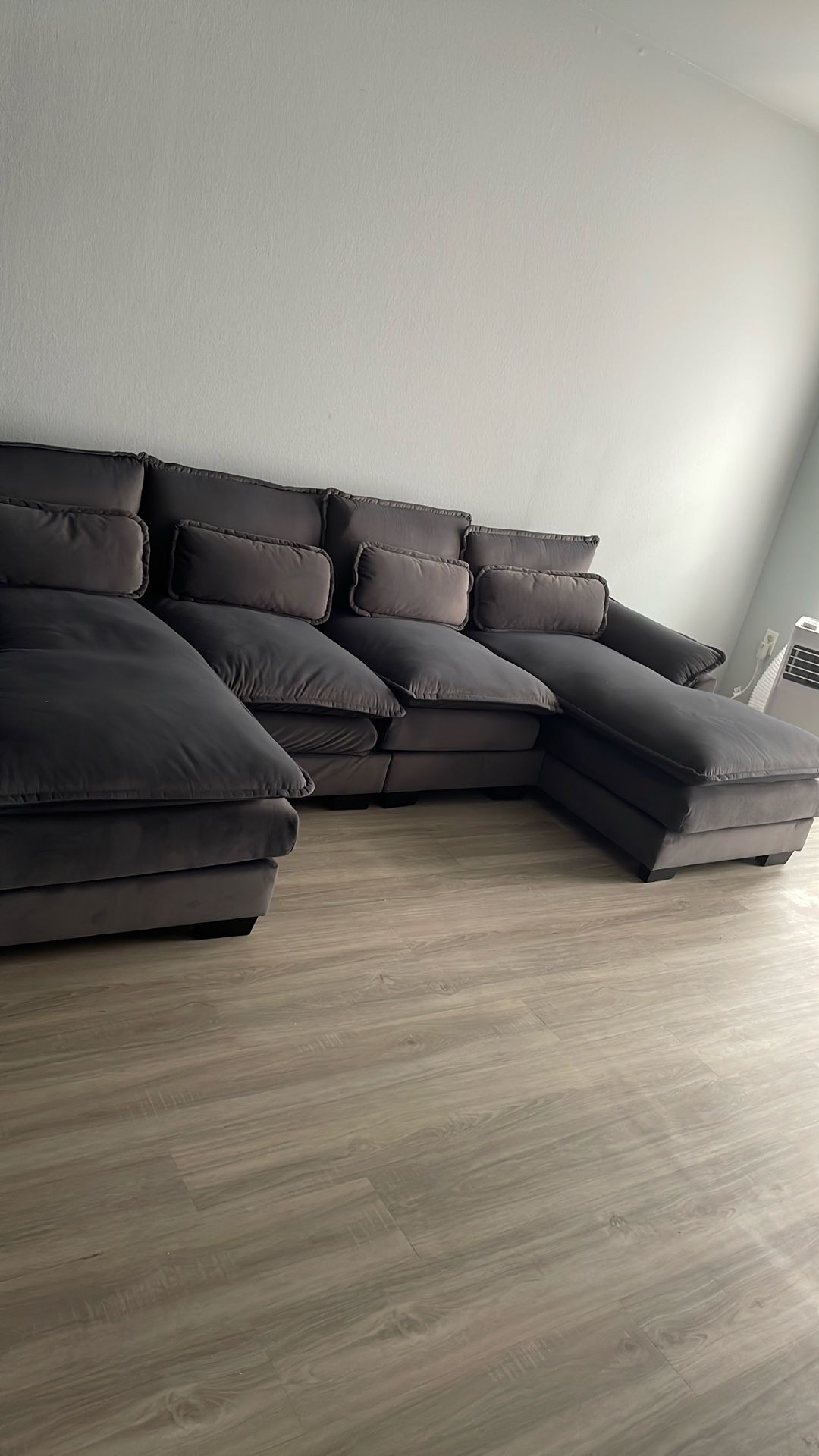 Gray Small Sectional With Two Grey Chairs