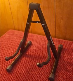 ChromaCast foldable/portable guitar stand. $10