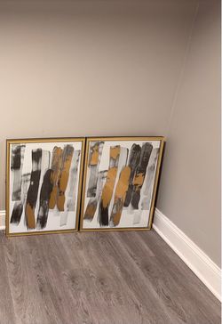 Black and gold hanging pictures $10 for both pet and smoking free home Black and gold hanging pictures $10 for both pet and smoking free home
