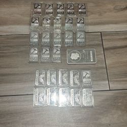 (28) - 1oz Silver Bars.  (1) - 10oz Silver Bar