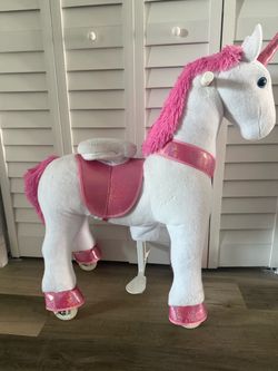 Pony ride a unicorn horse