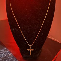 14k gold chain and 18k gold cross 
