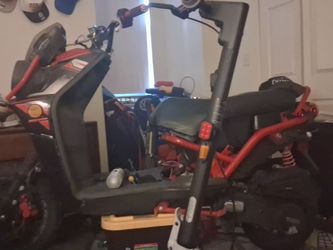 Red and Black Gas Scooter Moped