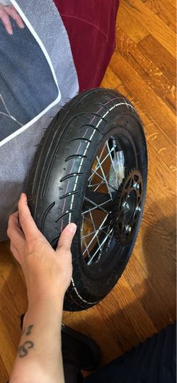 Motorcycle Wheel with Tire and Sprocket