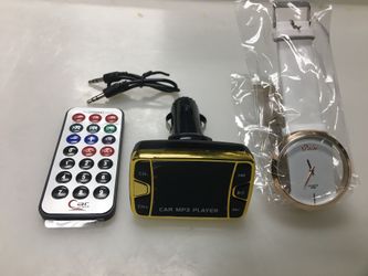 Car MP3 player + nice watch brand new+ car charger too
