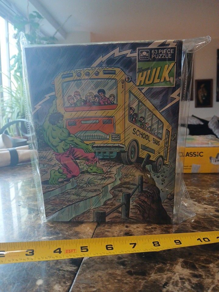 Collectible HULK 63 piece Jigsaw Puzzle By Marvel
The collectible HULK 63 piece Jigsaw Puzzle by Marvel is a nostalgic and colorful puzzle featuring