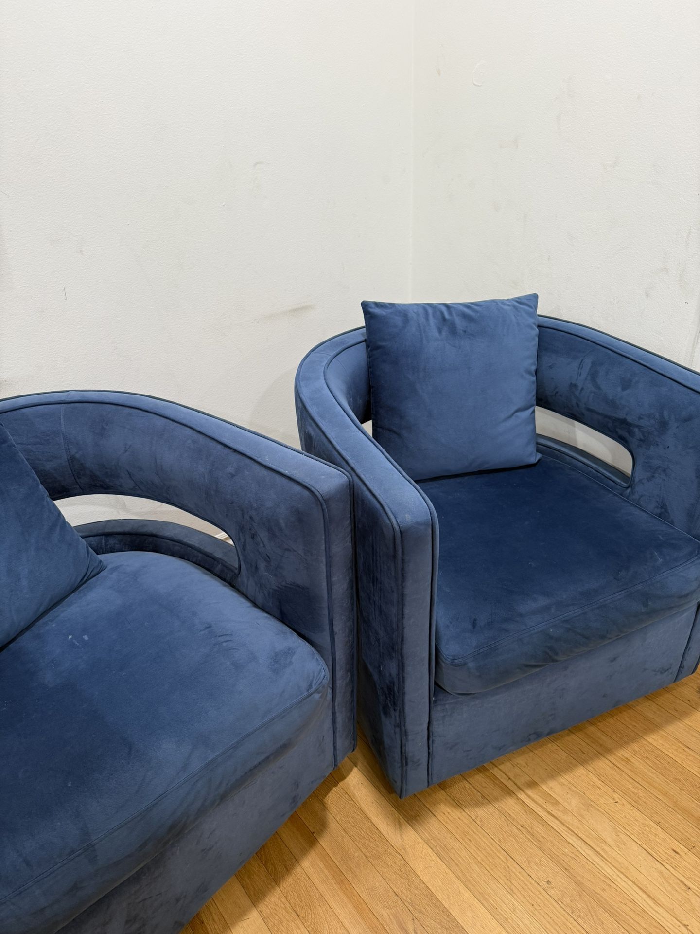 Two swivel armchairs for sale, in excellent condition.