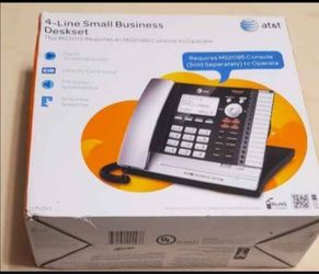 Brand new ATT  4 line bussiness desk set phone in box ( never used ).