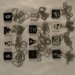 Lot of 12 horror-themed necklaces