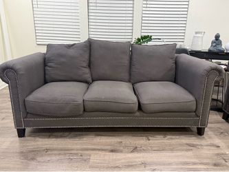 Couches, tv console and area rug